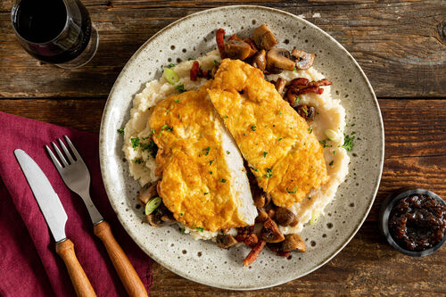 Hähnchen-Piccata mit Käse dazu Pilzgemüse mit Speck und Selleriemousse