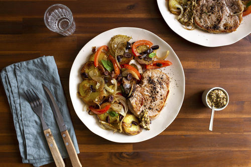 Würziges Schweinekotelett dazu Bratkartoffeln mit Oliven