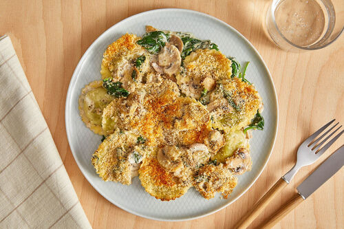 Überbackene Tortelli mit Champignons und Spinat