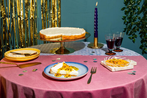 Fruchtiger Cheesecake mit Mürbteigboden und Passionsfrucht-Orangen-Topping