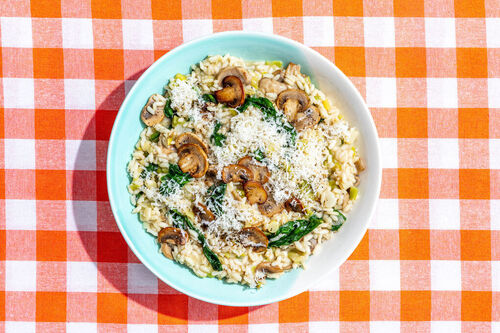 Cremiges Pilzrisotto mit frischem Spinat und Käse
