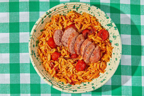 Gebackene Risoni mit Schweinswurst in Tomatensauce