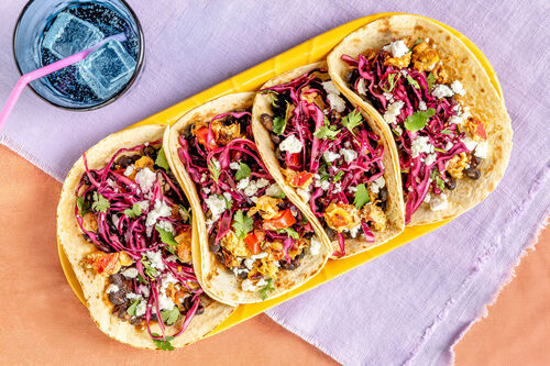 RS „Huevos Tirados“ und Feta im Wrap mit Bohnenpüree und Rotkohl