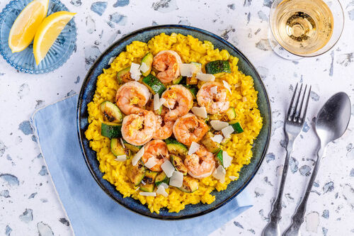 Safranrisotto mit doppelt Garnelen mit Zucchini und Zitrone
