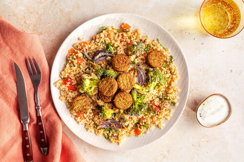 Falafel and crispy vegetables on tabouleh