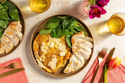 RSGetrüffeltesBioHähnchen auf Soufflé-Omelett mit frischem Babyspinat-Salat