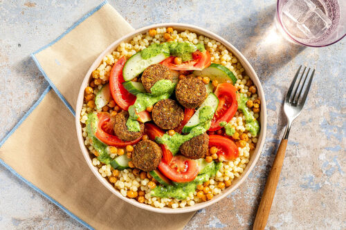 Pearl couscous bowl with falafel and chickpeas